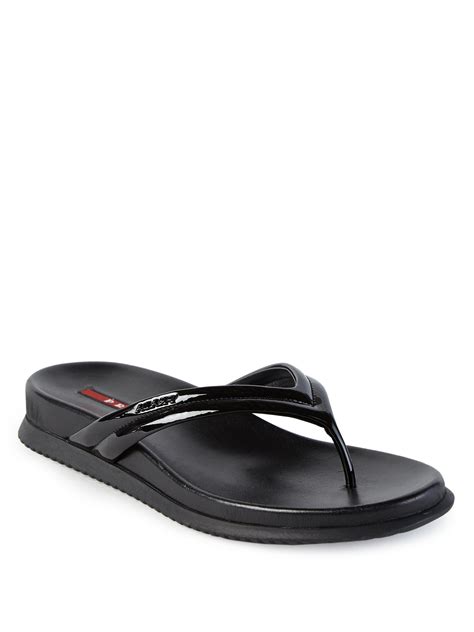 women prada flip flops